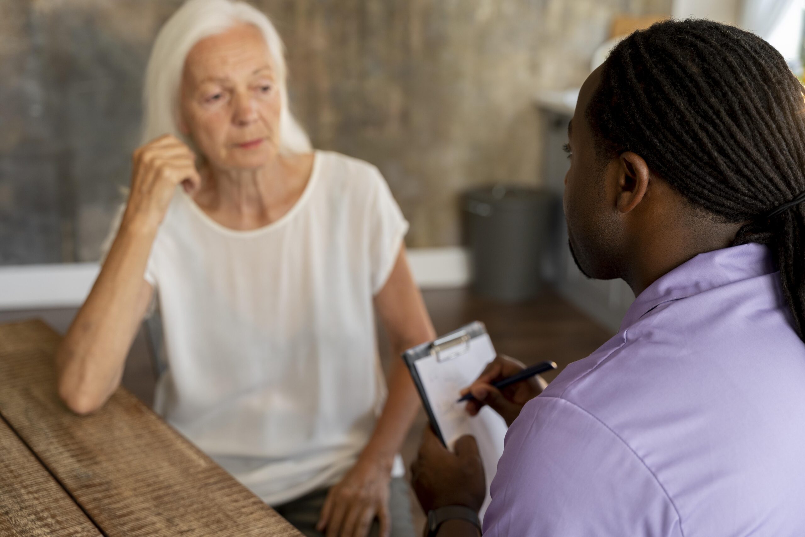 home care Oxfordshire support worker helping an older person at home