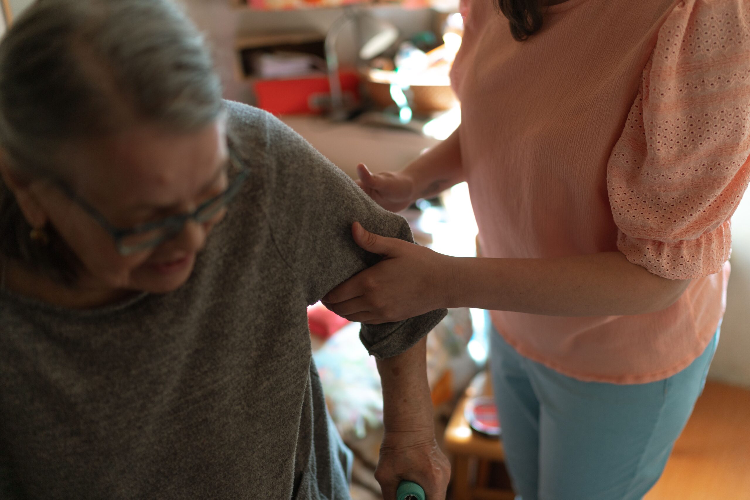 home care Aylesbury carer helping an older person move safely at home